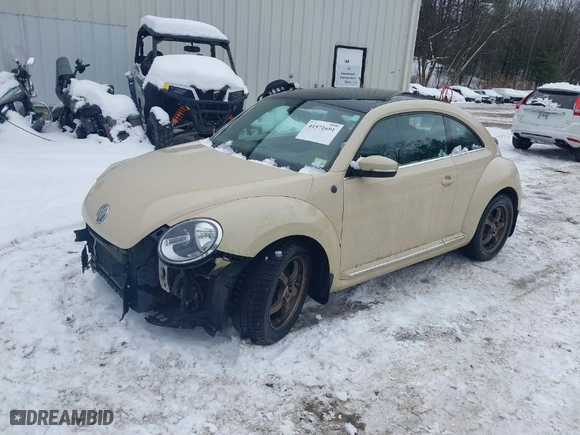 2019 Volkswagen Beetle S with VIN 3VWFD7AT1KM703684, listed as a IAAI auction lot 41571691 with 111,180 mi miles. Bid and sale history available at carsss.com. Image 2.