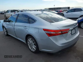 2014 Toyota Avalon Limited with VIN 4T1BK1EB0EU114837, listed as a IAAI auction lot 40051759 with 92,379 mi miles and . Bid and sale history available at DreamBid. Image 3.