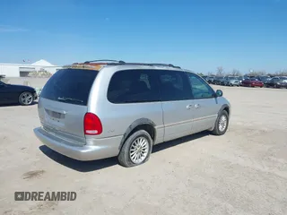 1999 Chrysler Town & Country LXi with VIN 1C4GP54L9XB872347, listed as a IAAI auction lot 41611666 with 224,817 mi miles. Bid and sale history available at carsss.com. Image 6.