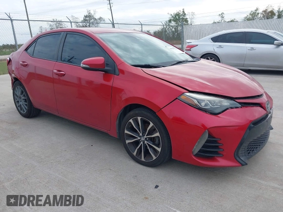 2017 Toyota Corolla L z VIN 5YFBURHE9HP610157, wystawiony jako IAAI lot #40999523 z przebiegiem 185 454 mil mil oraz . Historia ofert i sprzedaży dostępna na DreamBid. Obrazek 1.
