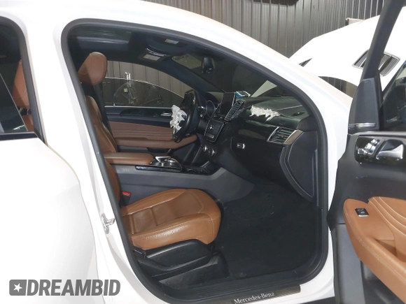 2016 Mercedes-Benz GLE 450 AMG with VIN 4JGED6EB1GA014187, listed as a IAAI auction lot 42341895 with 123,179 mi miles and . Bid and sale history available at DreamBid. Image 5.