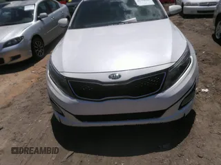 2015 Kia Optima LX with VIN KNAGM4A70F5645049, listed as a IAAI auction lot 42758383 with 214,934 mi miles and . Bid and sale history available at DreamBid. Image 6.