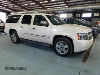 2010 Chevrolet Suburban LTZ with VIN 1GNUKKE3XAR253406, listed as a Copart auction lot 74265134 with 215,598 mi miles and Clean Title. Bid and sale history available at carsss.com. Image 4.