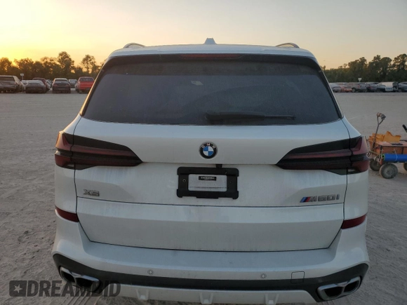 2024 BMW X5 M60i with VIN 5UX33EU07R9T12139, listed as a Copart auction lot 77326454 with 0 mi miles and Salvage Title. Bid and sale history available at carsss.com. Image 6.