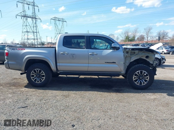 2020 Toyota Tacoma SR5 with VIN 3TMCZ5AN3LM320411, listed as a IAAI auction lot 41838498 with 50,252 mi miles and . Bid and sale history available at DreamBid. Image 14.
