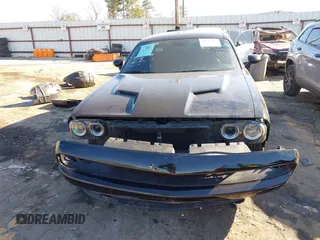 2020 Dodge Challenger SXT with VIN 2C3CDZAG1LH240339, listed as a IAAI auction lot 41613082 with 69,450 mi miles and . Bid and sale history available at DreamBid. Image 6.