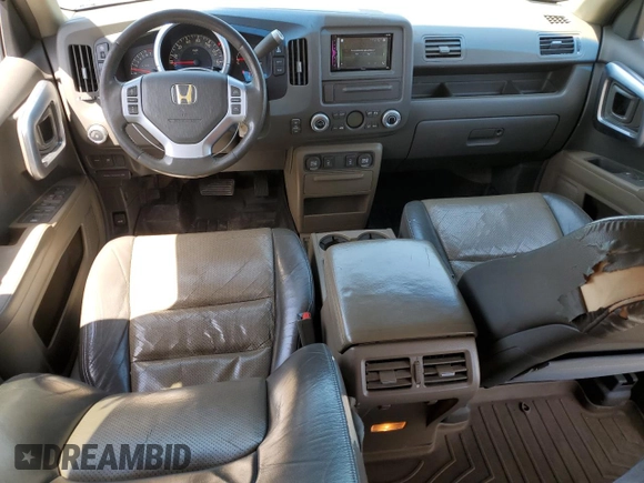 2006 Honda Ridgeline RTL with VIN 2HJYK16596H566552, listed as a Copart auction lot 57516525 with 192,023 mi miles and Salvage Title. Bid and sale history available at DreamBid. Image 8.