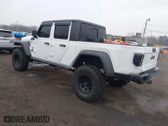 2020 Jeep Gladiator Sport S z VIN 1C6HJTAG0LL129461, wystawiony jako IAAI lot #41464713 z przebiegiem 66 625 mil mil oraz . Historia ofert i sprzedaży dostępna na DreamBid. Obrazek 3.