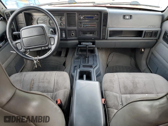 1996 Jeep Cherokee Sport with VIN 1J4FT68S8TL232241, listed as a Copart auction lot 82170904 with 287,125 mi miles and Salvage Title. Bid and sale history available at carsss.com. Image 8.