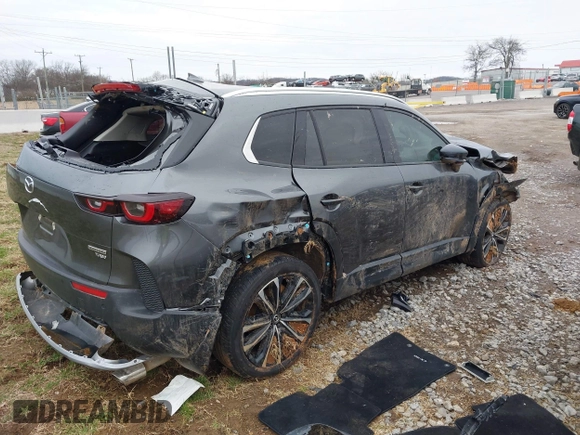 2024 Mazda CX-50 Premium Plus with VIN 7MMVABEY2RN234511, listed as a IAAI auction lot 41639766 with 8,705 mi miles and . Bid and sale history available at DreamBid. Image 4.