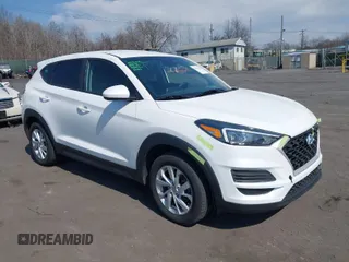 2019 Hyundai Tucson SE with VIN KM8J2CA44KU847421, listed as a IAAI auction lot 41853584 with 80,961 mi miles. Bid and sale history available at carsss.com. Image 1.