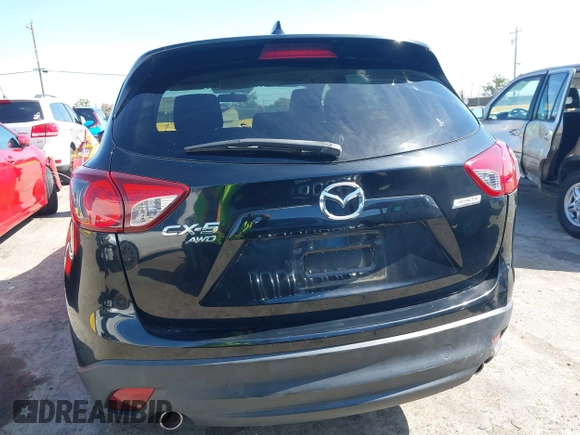 2016 Mazda CX-5 Touring z VIN JM3KE4CY2G0656270, wystawiony jako IAAI lot #42344489 z przebiegiem 60 449 mil mil oraz . Historia ofert i sprzedaży dostępna na DreamBid. Obrazek 17.