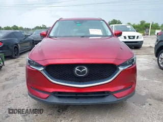 2018 Mazda CX-5 Grand Touring with VIN JM3KFADM5J0437365, listed as a IAAI auction lot 42657919 with 96,760 mi miles and . Bid and sale history available at DreamBid. Image 12.