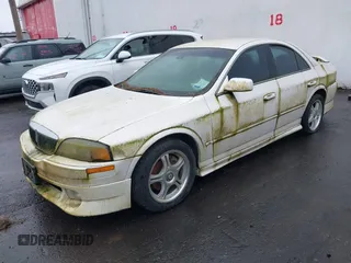2000 Lincoln LS with VIN 1LNHM87A5YY873918, listed as a IAAI auction lot 41988309 with 1 mi miles. Bid and sale history available at carsss.com. Image 2.