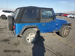 2003 Jeep Wrangler X z VIN 1J4FA39S33P320254, wystawiony jako Copart lot #52392525 z przebiegiem 206 325 mil mil oraz Szkoda całkowita • Salvage title. Historia ofert i sprzedaży dostępna na DreamBid. Obrazek 3.