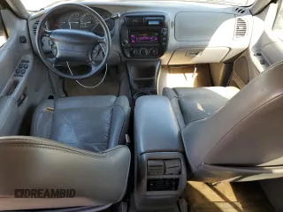 1997 Mercury Mountaineer z VIN 4M2DU52P5VUJ58731, wystawiony jako Copart lot #69710404 z przebiegiem 266 522 mil mil oraz Tytuł czysty. Historia ofert i sprzedaży dostępna na DreamBid. Obrazek 8.