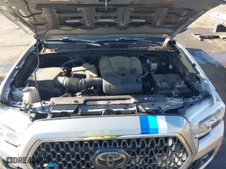 2018 Toyota Tacoma SR with VIN 3TMCZ5ANXJM184341, listed as a IAAI auction lot 41376837 with 94,560 mi miles. Bid and sale history available at carsss.com. Image 10.