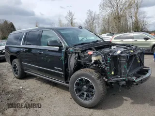 2020 GMC Yukon XL Denali with VIN 1GKS2HKJ6LR303991, listed as a Copart auction lot 51335235 with 31,280 mi miles and Salvage Title. Bid and sale history available at carsss.com. Image 4.