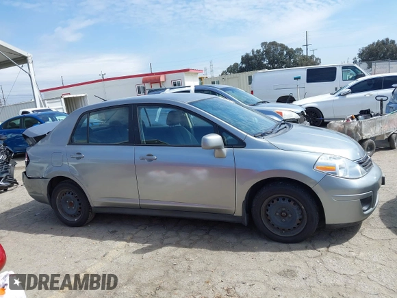 2011 Nissan Versa 1.8 S with VIN 3N1BC1AP0BL423655, listed as a IAAI auction lot 41816518 with 89,862 mi miles. Bid and sale history available at carsss.com. Image 13.