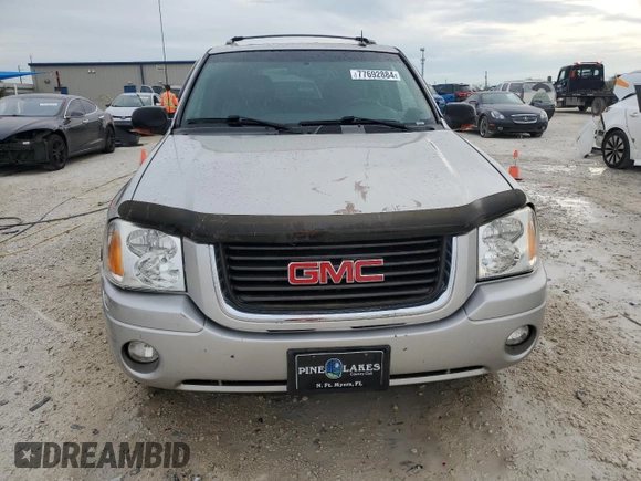 2004 GMC Envoy SLT with VIN 1GKDT13S742106035, listed as a Copart auction lot 77692884 with 122,188 mi miles and Non Repairable. Bid and sale history available at DreamBid. Image 5.