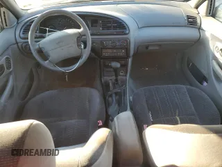 1997 Ford Contour с VIN 3FALP6535VM112253, выставлен на аукционе Copart как лот 80501924 с пробегом 116 778 миль миль и Списание • Salvage title. История ставок и продаж доступна на DreamBid. Изображение 8.
