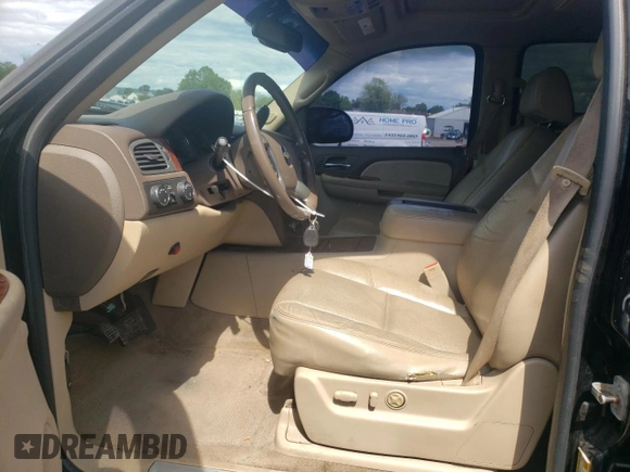 2009 Chevrolet Tahoe LTZ with VIN 1GNFK33039J125428, listed as a Copart auction lot 57962875 with 245,554 mi miles and Salvage title. Bid and sale history available at DreamBid. Image 7.
