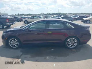 2013 Lincoln MKZ z VIN 3LN6L2GK2DR808761, wystawiony jako IAAI lot #42562086 z przebiegiem 124 087 mil mil oraz . Historia ofert i sprzedaży dostępna na DreamBid. Obrazek 15.