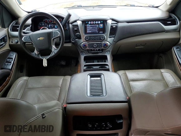 2018 Chevrolet Suburban Premier with VIN 1GNSCJKC5JR293962, listed as a Copart auction lot 50641835 with 137,598 mi miles and Salvage Title. Bid and sale history available at DreamBid. Image 8.