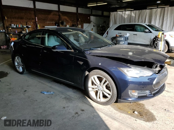 2014 Tesla Model S 60 with VIN 5YJSA1H16EFP43523, listed as a Copart auction lot 63291145 with Not provided miles and Clean title. Bid and sale history available at DreamBid. Image 4.