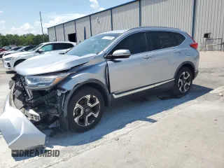 2018 Honda CR-V Touring with VIN 7FARW1H9XJE036512, listed as a Copart auction lot 58318555 with 47,112 mi miles and Salvage title. Bid and sale history available at DreamBid. Image 1.