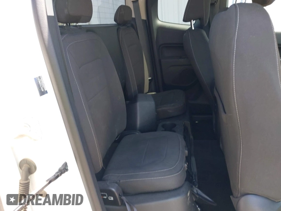 2015 GMC Canyon 2WD SLE z VIN 1GTH5BEA4F1239815, wystawiony jako IAAI lot #42135355 z przebiegiem 110 696 mil mil oraz . Historia ofert i sprzedaży dostępna na DreamBid. Obrazek 8.