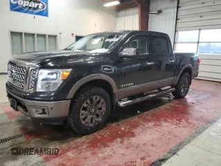 2017 Nissan Titan Platinum Reserve z VIN 1N6AA1E57HN506061, wystawiony jako Copart lot #85687874 z przebiegiem 153 996 mil mil oraz Szkoda całkowita • Salvage title. Historia ofert i sprzedaży dostępna na DreamBid. Obrazek 1.