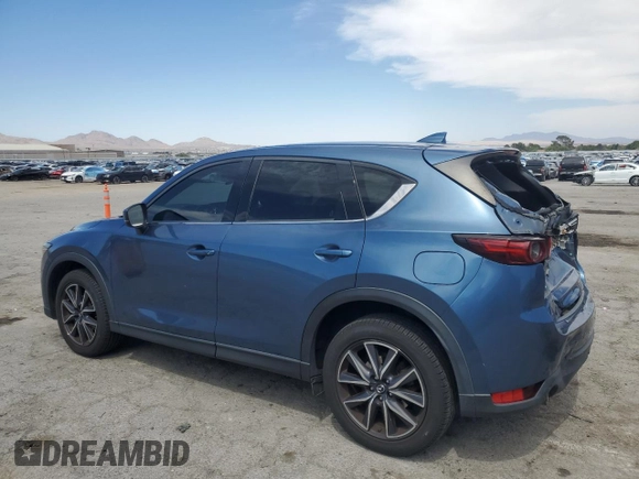 2018 Mazda CX-5 Grand Touring with VIN JM3KFBDM3J0323211, listed as a Copart auction lot 61166735 with Not provided miles and Salvage title. Bid and sale history available at DreamBid. Image 2.