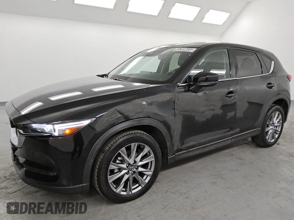 2021 Mazda CX-5 Grand Touring with VIN JM3KFBDM6M0487606, listed as a Copart auction lot 45399655 with 25,241 mi miles and Clean Title. Bid and sale history available at DreamBid. Image 1.