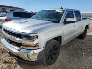 2018 Chevrolet Silverado 1500 LT with VIN 3GCPCREC7JG642970, listed as a Copart auction lot 84877084 with 64,756 mi miles and Salvage Title. Bid and sale history available at carsss.com. Image 1.