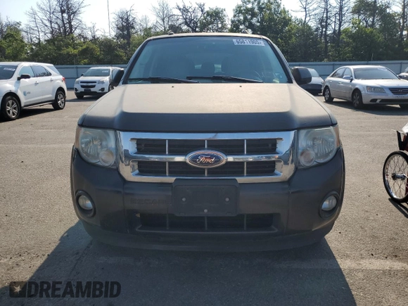 2011 Ford Escape Hybrid with VIN 1FMCU4K35BKA16469, listed as a Copart auction lot 65811905 with 401,583 mi miles and Clean title. Bid and sale history available at DreamBid. Image 5.
