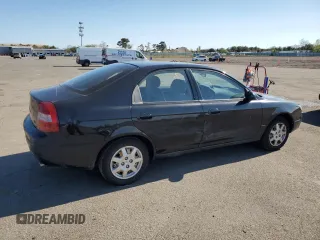 2001 Kia Spectra GS z VIN KNAFB161115036033, wystawiony jako Copart lot #55939335 z przebiegiem 76 414 mil mil oraz Szkoda całkowita • Salvage title. Historia ofert i sprzedaży dostępna na DreamBid. Obrazek 3.