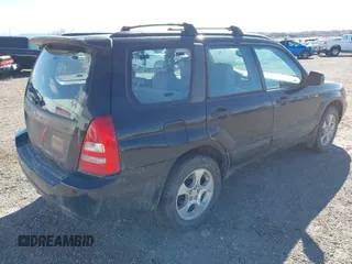 2003 Subaru Forester XS with VIN JF1SG65673G743292, listed as a IAAI auction lot 41587235 with 251,523 mi miles. Bid and sale history available at carsss.com. Image 4.