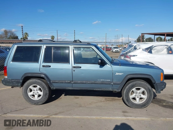 1998 Jeep Cherokee Sport with VIN 1J4FT68S0WL231959, listed as a IAAI auction lot 41680076 with 252,369 mi miles. Bid and sale history available at carsss.com. Image 13.