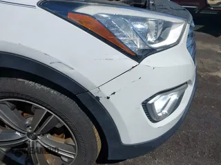 2014 Hyundai Santa Fe Limited z VIN KM8SNDHF8EU080086, wystawiony jako IAAI lot #41995020 z przebiegiem 168 532 mil mil oraz . Historia ofert i sprzedaży dostępna na DreamBid. Obrazek 6.