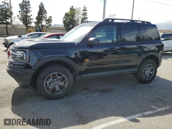 2023 Ford Bronco Sport Badlands z VIN 3FMCR9D97PRD35830, wystawiony jako Copart lot #56950865 z przebiegiem 7 401 mil mil oraz Szkoda całkowita • Salvage title. Historia ofert i sprzedaży dostępna na DreamBid. Obrazek 1.