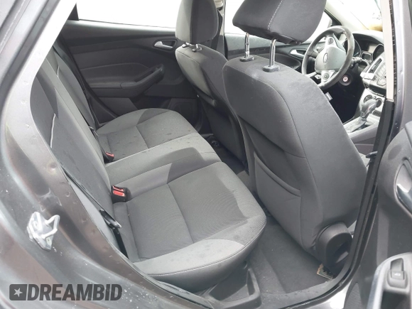 2012 Ford Focus SE z VIN 1FAHP3K25CL434955, wystawiony jako IAAI lot #41698082 z przebiegiem Nie podano mil oraz . Historia ofert i sprzedaży dostępna na DreamBid. Obrazek 8.