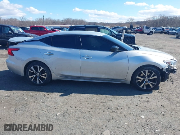 2016 Nissan Maxima SV z VIN 1N4AA6AP4GC446635, wystawiony jako IAAI lot #41672861 z przebiegiem 118 377 mil mil oraz . Historia ofert i sprzedaży dostępna na DreamBid. Obrazek 14.
