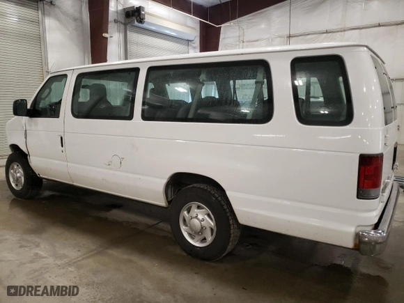 2010 Ford Econoline Wagon XL with VIN 1FBSS3BL8ADA62210, listed as a Copart auction lot 69939574 with 111,593 mi miles and Salvage Title. Bid and sale history available at carsss.com. Image 2.