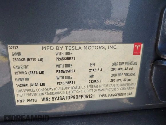 2013 Tesla Model S Performance z VIN 5YJSA1DP9DFP06121, wystawiony jako IAAI lot #42511097 z przebiegiem 100 990 mil mil oraz . Historia ofert i sprzedaży dostępna na DreamBid. Obrazek 9.