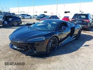 2020 McLaren GT with VIN SBM22GCA1LW000498, listed as a IAAI auction lot 41265247 with 18,465 mi miles. Bid and sale history available at carsss.com. Image 2.