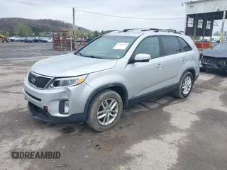 2014 Kia Sorento LX with VIN 5XYKTCA63EG506489, listed as a IAAI auction lot 41965074 with 143,875 mi miles and . Bid and sale history available at carsss.com. Image 2.