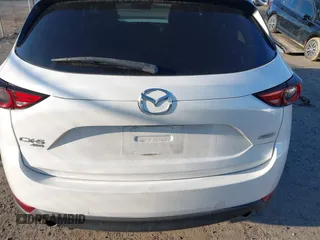 2018 Mazda CX-5 S Premium with VIN JM3KFBDM8J1419006, listed as a IAAI auction lot 41498658 with 123,622 mi miles and . Bid and sale history available at DreamBid. Image 17.