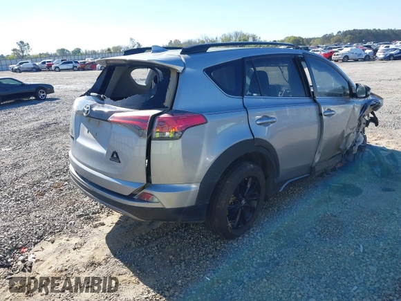 2018 Toyota RAV4 XLE with VIN 2T3RFREVXJW748993, listed as a IAAI auction lot 41878888 with 111,760 mi miles and . Bid and sale history available at DreamBid. Image 4.