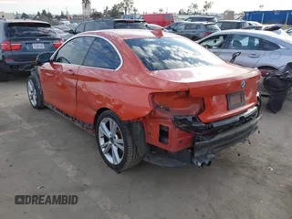 2015 BMW 2 Series 228i with VIN WBA1F9C56FVW98461, listed as a IAAI auction lot 41663193 with 94,584 mi miles. Bid and sale history available at carsss.com. Image 3.